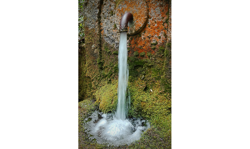 Water pouring from pipe